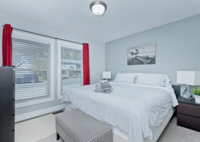 Second bedroom with queen bed at MacKenzie House, Peachland BC