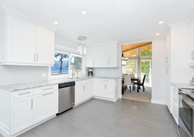 Fully equipped kitchen with stainless appliances at MacKenzie House, Peachland BC
