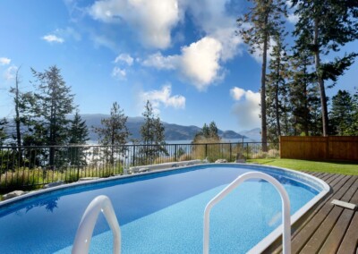 Private pool with Okanagan Lake and the hills beyond, MacKenzie House Peachland